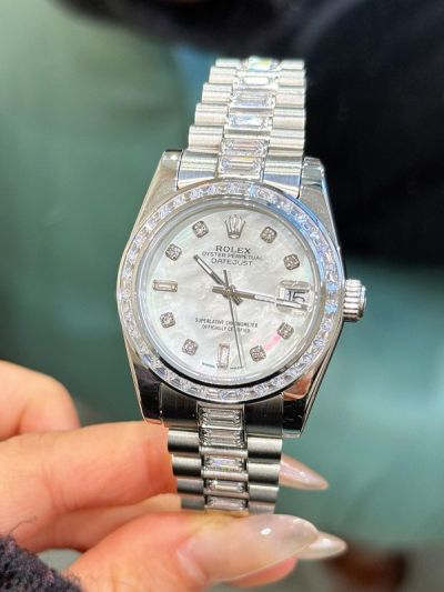 Rolex Datejust 31mm Osytersteel Bracelet White MOP Dial Lady Baguette Watch